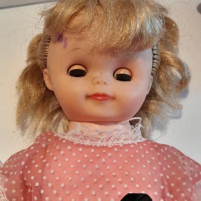 Plastic blonde doll with pig tails and Unknown brand Antique Kewpie like cloth with painted face doll