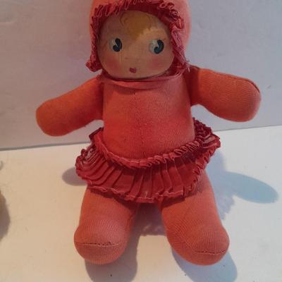 Plastic blonde doll with pig tails and Unknown brand Antique Kewpie like cloth with painted face doll