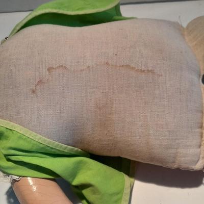 Very old and well-loved composition and cloth baby doll