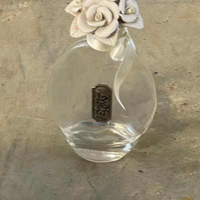 Two Vintage Perfume Bottles with Ceramic Flower Tops