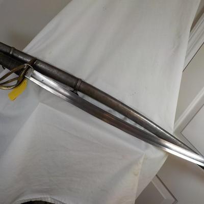 1840 US. Calvary Officers Sword, Brass & 37 in long. Est. $140 to $300.
