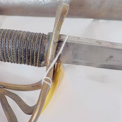1840 US. Calvary Officers Sword, Brass & 37 in long. Est. $140 to $300.
