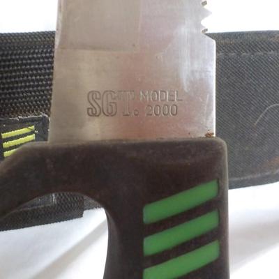 SGT. 111 Tactical survival knife, Lenght of blade approx. 12in Handle 4.5/ est. $25 to$50.