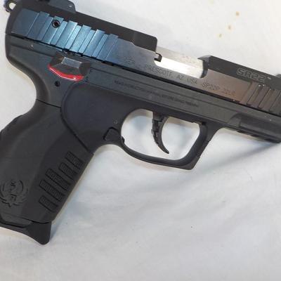 Ruger SR22 pistol with Magazine. est.$150 to $400.