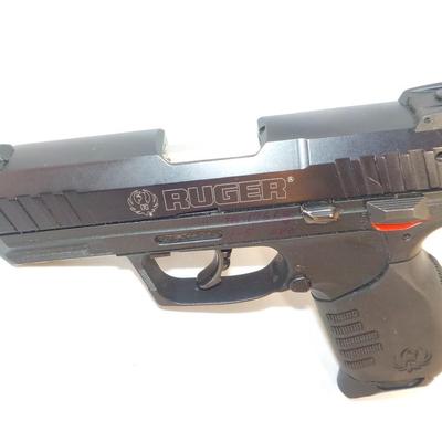 Ruger SR22 pistol with Magazine. est.$150 to $400.