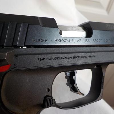 Ruger SR22 pistol with Magazine. est.$150 to $400.