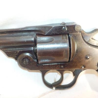 US. Arms flip top, double action revolver 32 cal. est. $125 to $ 190.