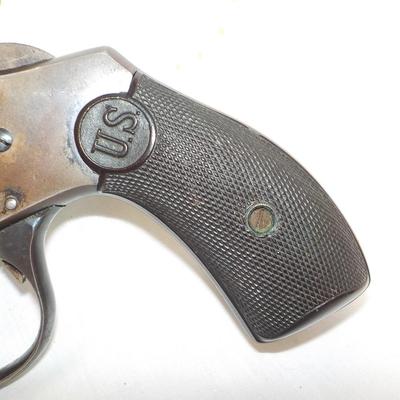 US. Arms flip top, double action revolver 32 cal. est. $125 to $ 190.