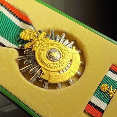 Military Medal " Liberation of Kuwait" with holding box. est. $20 t0 $35.