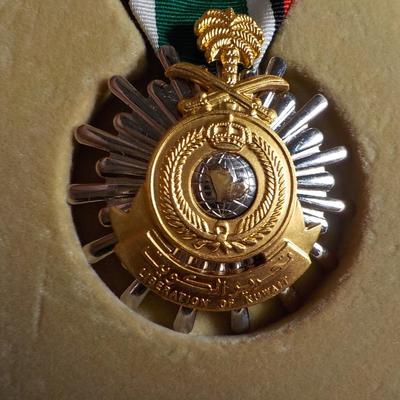 Military Medal " Liberation of Kuwait" with holding box. est. $20 t0 $35.