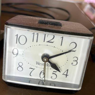 Two electric alarm clocks