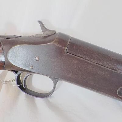 H & R Single shot 12 gauge shotgun, est. $125 to $200.