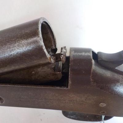 H & R Single shot 12 gauge shotgun, est. $125 to $200.