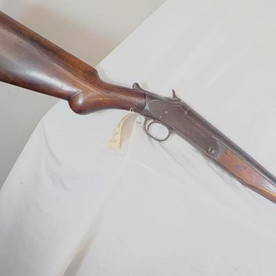 H & R Single shot 12 gauge shotgun, est. $125 to $200.