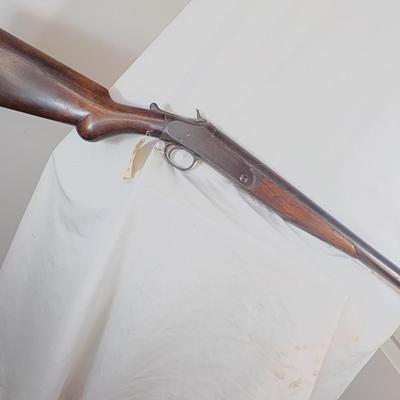 H & R Single shot 12 gauge shotgun, est. $125 to $200.