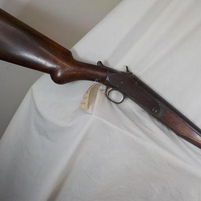 H & R Single shot 12 gauge shotgun, est. $125 to $200.