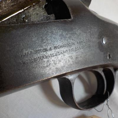 H & R Single shot 12 gauge shotgun, est. $125 to $200.