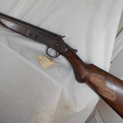 H & R Single shot 12 gauge shotgun, est. $125 to $200.