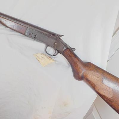 H & R Single shot 12 gauge shotgun, est. $125 to $200.