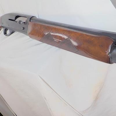 Remington Classic 11-48 12 gauge shot gun. est. $200 to $475.