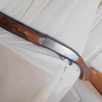 Remington Classic 11-48 12 gauge shot gun. est. $200 to $475.