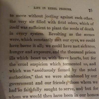 Real 1866 Civil War Book & Hat (repro) " Life and Death in Rebel Prisons". / est. $50 to $200.