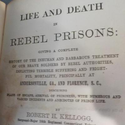Real 1866 Civil War Book & Hat (repro) " Life and Death in Rebel Prisons". / est. $50 to $200.