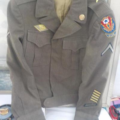 World War 2 Army field dress jacket wool, est. $70 to $150.