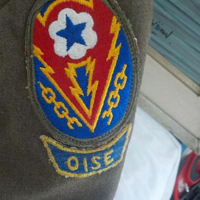 World War 2 Army field dress jacket wool, est. $70 to $150.