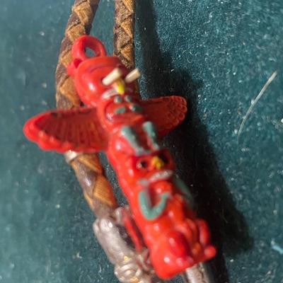 Vintage Red Celluloid Totem Pole on Bolo