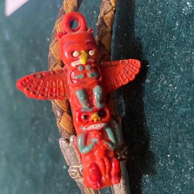 Vintage Red Celluloid Totem Pole on Bolo