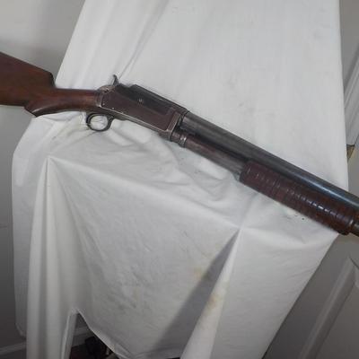 Marlin model 19-  12 Gauge pump shot gun. est. $190 to $375.