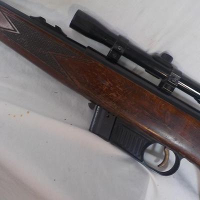 Steyr 22 Cal. rifle w/ scope, made in Austria, est $130 to $220.