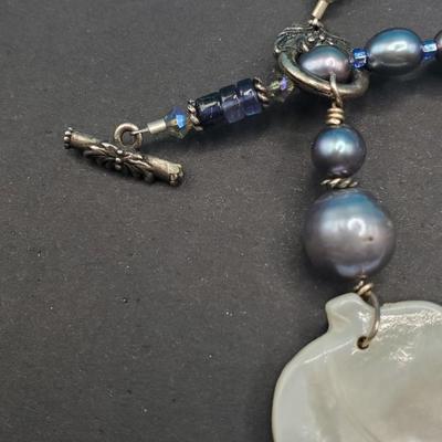 Mother of Pearl carved flower and baroque pearl necklace