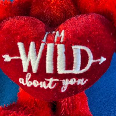 PLUSH ELMO WITH â€œIâ€™M WILD ABOUT YOUâ€ VELVET HEART