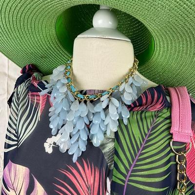 090 Palm Leaf Cover Up ,Green Straw Hat, Blue Statement Necklace, Pink Faux Leather Purse