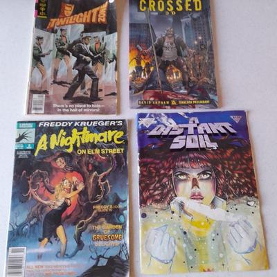 Horror Comic books and other books Crossed 3D, Nightmare on Elm Street, Distant Soh, and Twilight zone.