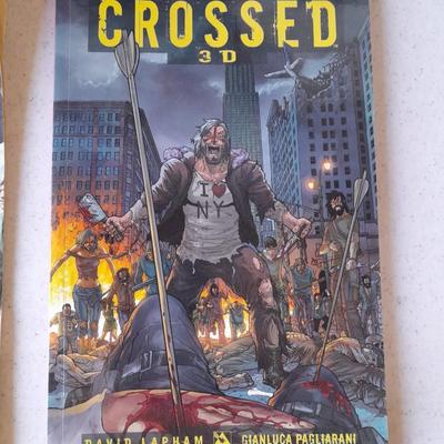 Horror Comic books and other books Crossed 3D, Nightmare on Elm Street, Distant Soh, and Twilight zone.