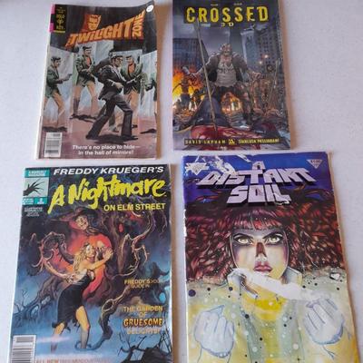 Horror Comic books and other books Crossed 3D, Nightmare on Elm Street, Distant Soh, and Twilight zone.