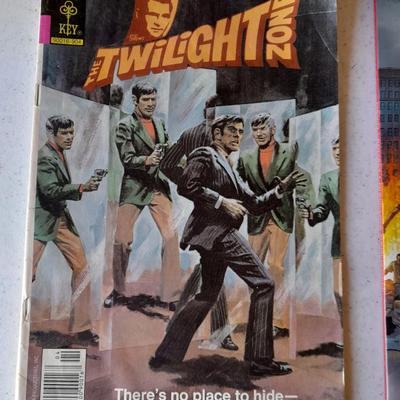 Horror Comic books and other books Crossed 3D, Nightmare on Elm Street, Distant Soh, and Twilight zone.