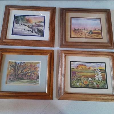 Set of 4 signed and numbered original watercolor framed pictures.
