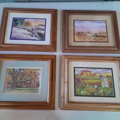 Set of 4 signed and numbered original watercolor framed pictures.