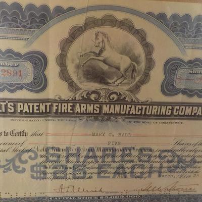 " Colt's Gun Mfg. Co. Stock Certifcate (canceled) and Colt ad. est. $30 to $70.