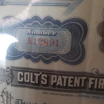 " Colt's Gun Mfg. Co. Stock Certifcate (canceled) and Colt ad. est. $30 to $70.
