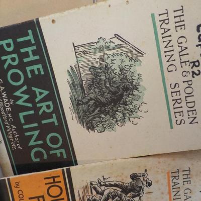 WW1 and WW2 Combat Training Books and a Display Grenade (Empty) est. $25 to$55.