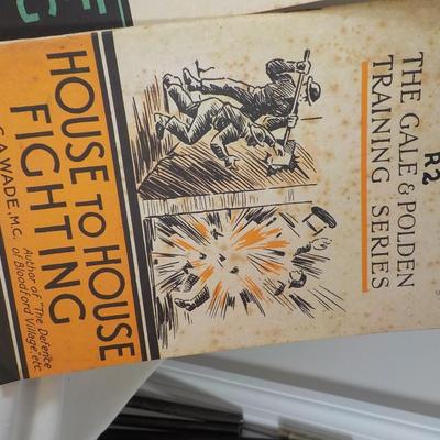 WW1 and WW2 Combat Training Books and a Display Grenade (Empty) est. $25 to$55.