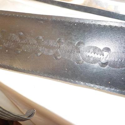 Swedish Armor sword approx. 26 in. with leather scabbard. est. $50 to $130..