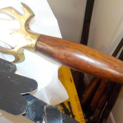 Swedish Armor sword approx. 26 in. with leather scabbard. est. $50 to $130..