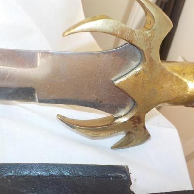 Swedish Armor sword approx. 26 in. with leather scabbard. est. $50 to $130..