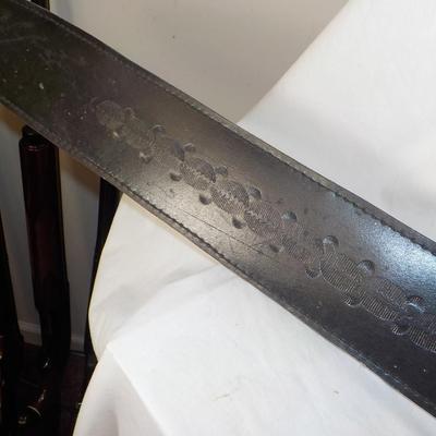 Swedish Armor sword approx. 26 in. with leather scabbard. est. $50 to $130..